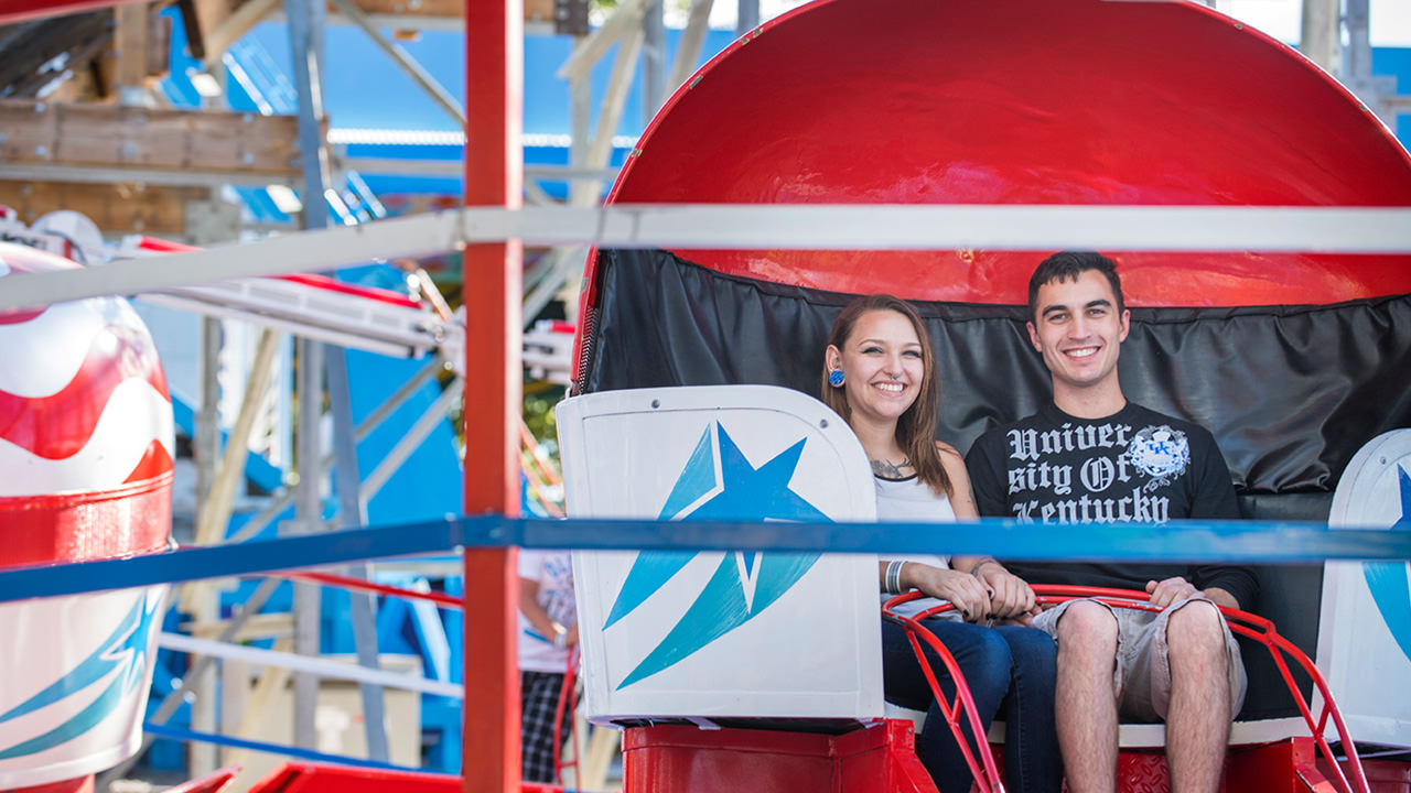 Guests on the Tilt-A-Whirl